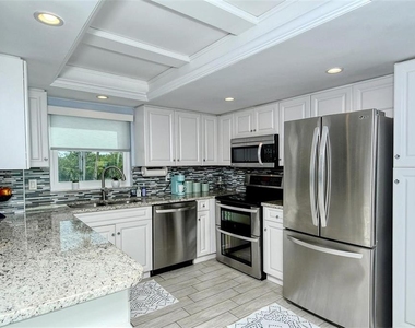 1215 S Portofino Drive N - Photo Thumbnail 2