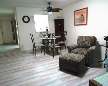 7050 W Country Club Drive N - Photo Thumbnail 2