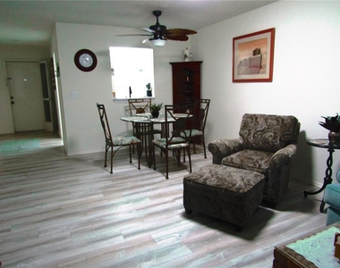 7050 W Country Club Drive N - Photo Thumbnail 4