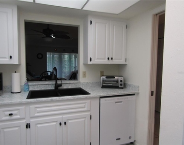7050 W Country Club Drive N - Photo Thumbnail 8