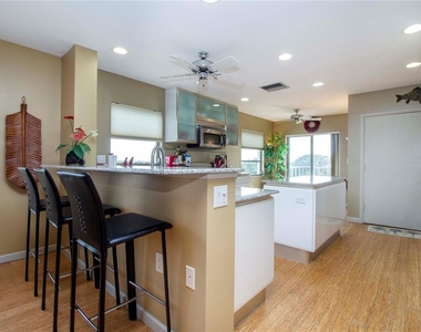 8625 Midnight Pass Road - Photo Thumbnail 16