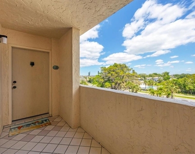 4325 Gulf Of Mexico Drive - Photo Thumbnail 1