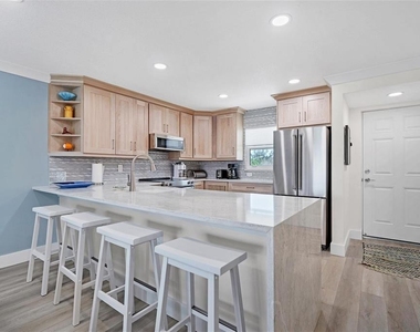 9393 Midnight Pass Road - Photo Thumbnail 7