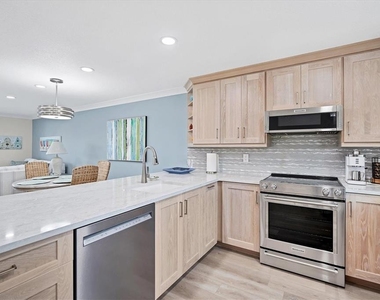 9393 Midnight Pass Road - Photo Thumbnail 9