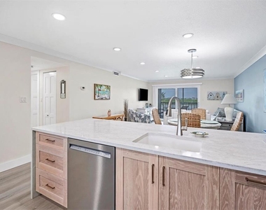 9393 Midnight Pass Road - Photo Thumbnail 11
