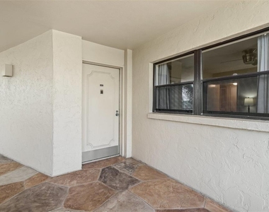 8770 Midnight Pass Road - Photo Thumbnail 4
