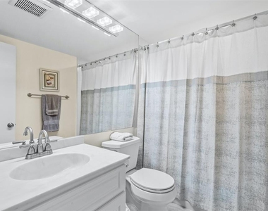 8770 Midnight Pass Road - Photo Thumbnail 20