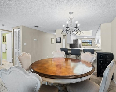 8770 Midnight Pass Road - Photo Thumbnail 10