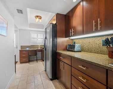 5760 Midnight Pass Road - Photo Thumbnail 4