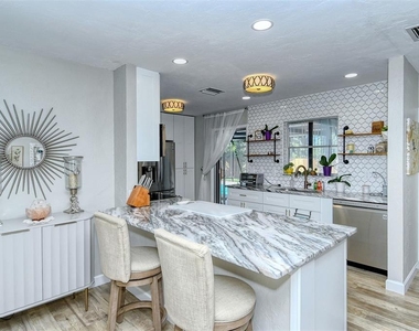 6758 S Lockwood Ridge Road - Photo Thumbnail 9