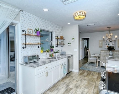6758 S Lockwood Ridge Road - Photo Thumbnail 16