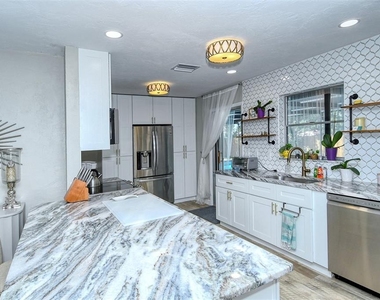 6758 S Lockwood Ridge Road - Photo Thumbnail 14