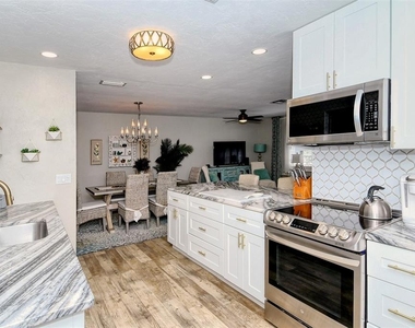 6758 S Lockwood Ridge Road - Photo Thumbnail 17