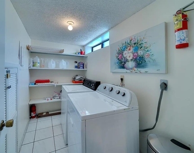 6157 Midnight Pass Road - Photo Thumbnail 21