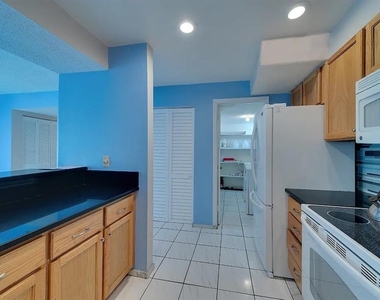 6157 Midnight Pass Road - Photo Thumbnail 9