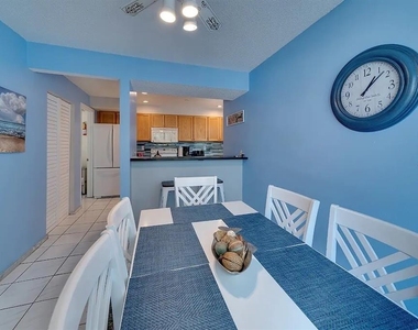 6157 Midnight Pass Road - Photo Thumbnail 3