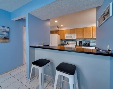 6157 Midnight Pass Road - Photo Thumbnail 20