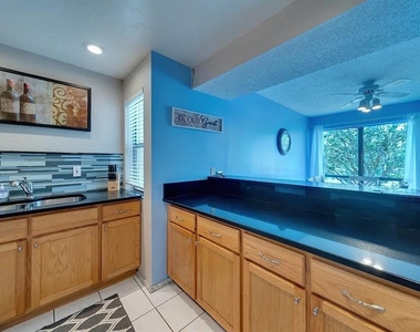 6157 Midnight Pass Road - Photo Thumbnail 10