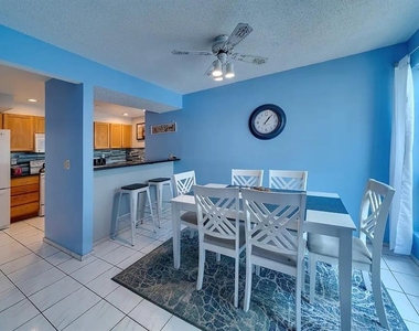 6157 Midnight Pass Road - Photo Thumbnail 2