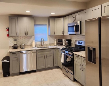 1247 S Newkirk Street S - Photo Thumbnail 4