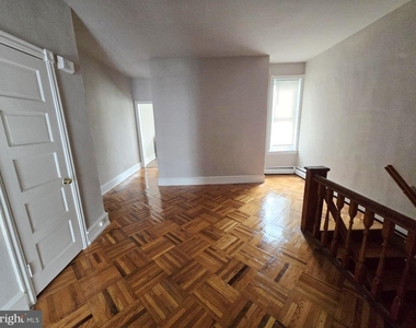 5709 Leonard Street - Photo Thumbnail 2