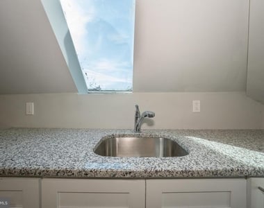 122 E 3rd Street - Photo Thumbnail 4