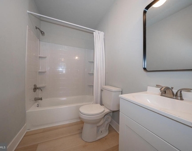 122 E 3rd Street - Photo Thumbnail 8