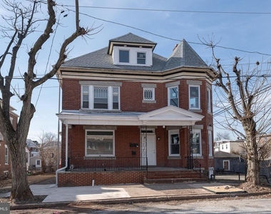122 E 3rd Street - Photo Thumbnail 0