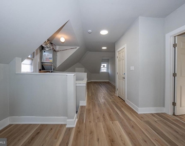 122 E 3rd Street - Photo Thumbnail 6