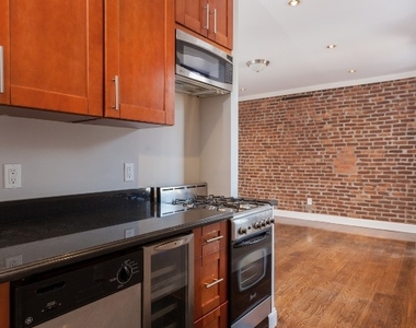 338 East 100th Street - Photo Thumbnail 3