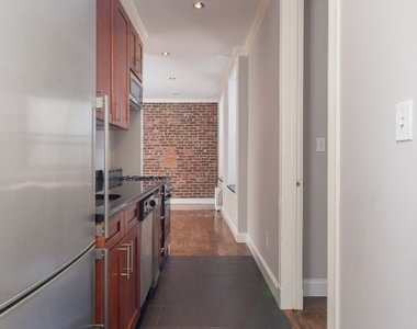 338 East 100th Street - Photo Thumbnail 1