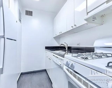 E 46th St - Photo Thumbnail 2