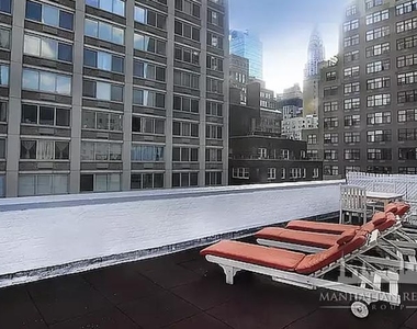 E 46th St - Photo Thumbnail 4