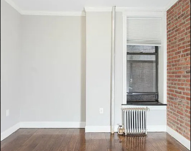 436 West 52nd Street - Photo Thumbnail 2