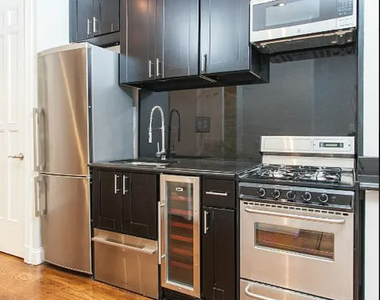 436 West 52nd Street - Photo Thumbnail 0