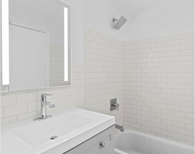 513 E 5th St - Photo Thumbnail 3