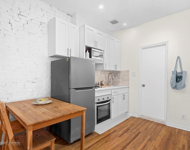 513 E 5th St - Photo Thumbnail 2