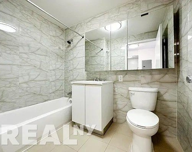E 2nd Street - Photo Thumbnail 6