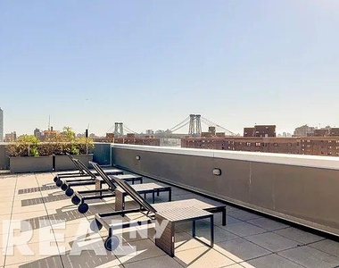 E 2nd Street - Photo Thumbnail 11