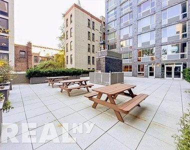 E 2nd Street - Photo Thumbnail 14