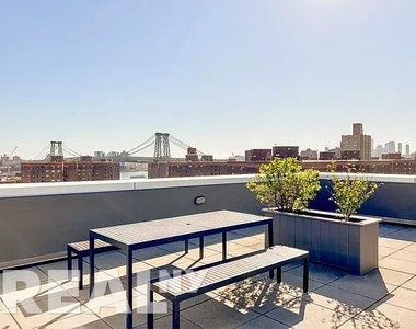 E 2nd Street - Photo Thumbnail 12