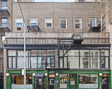 East 27th Street - Photo Thumbnail 3