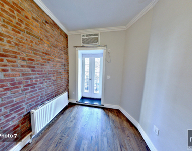 W 51st St. - Photo Thumbnail 3