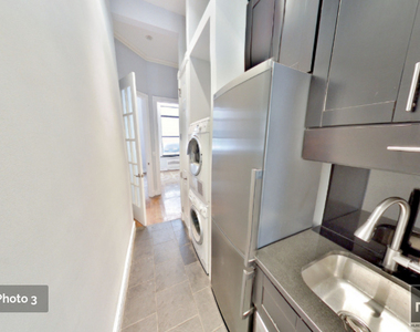 W 51st St. - Photo Thumbnail 1
