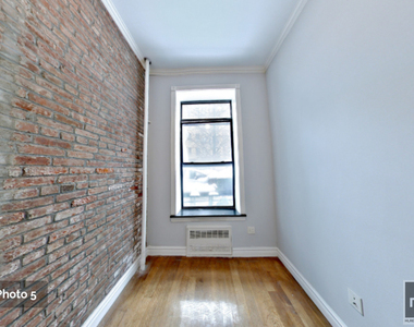 W 51st St. - Photo Thumbnail 2