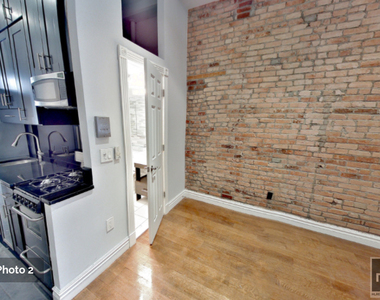 W 51st St. - Photo Thumbnail 0
