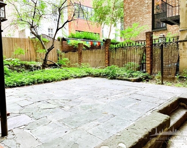 E 16th St - Photo Thumbnail 0