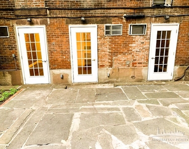E 16th St - Photo Thumbnail 5