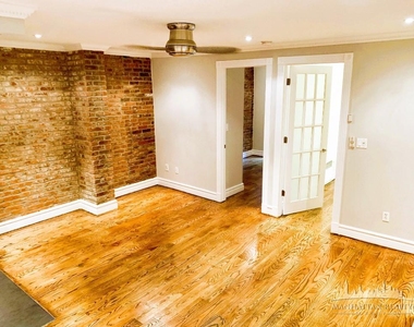 E 16th St - Photo Thumbnail 4