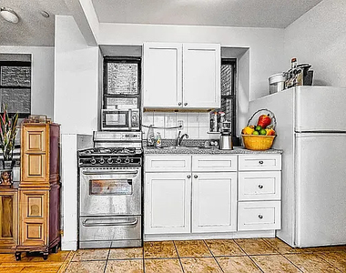 185 East Houston Street - Photo Thumbnail 1